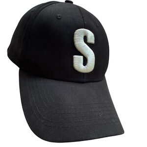 EQC Hotel & Casino Black Cap with White “S” Logo from Melonwear